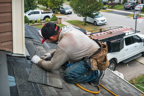 Professional Roofing technician working in Otisville, MI
